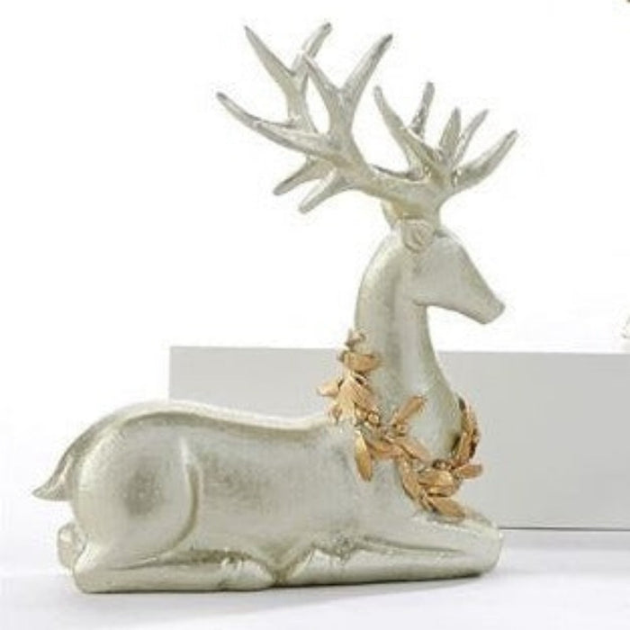 Laying Gold Wreath Reindeer Figurine
